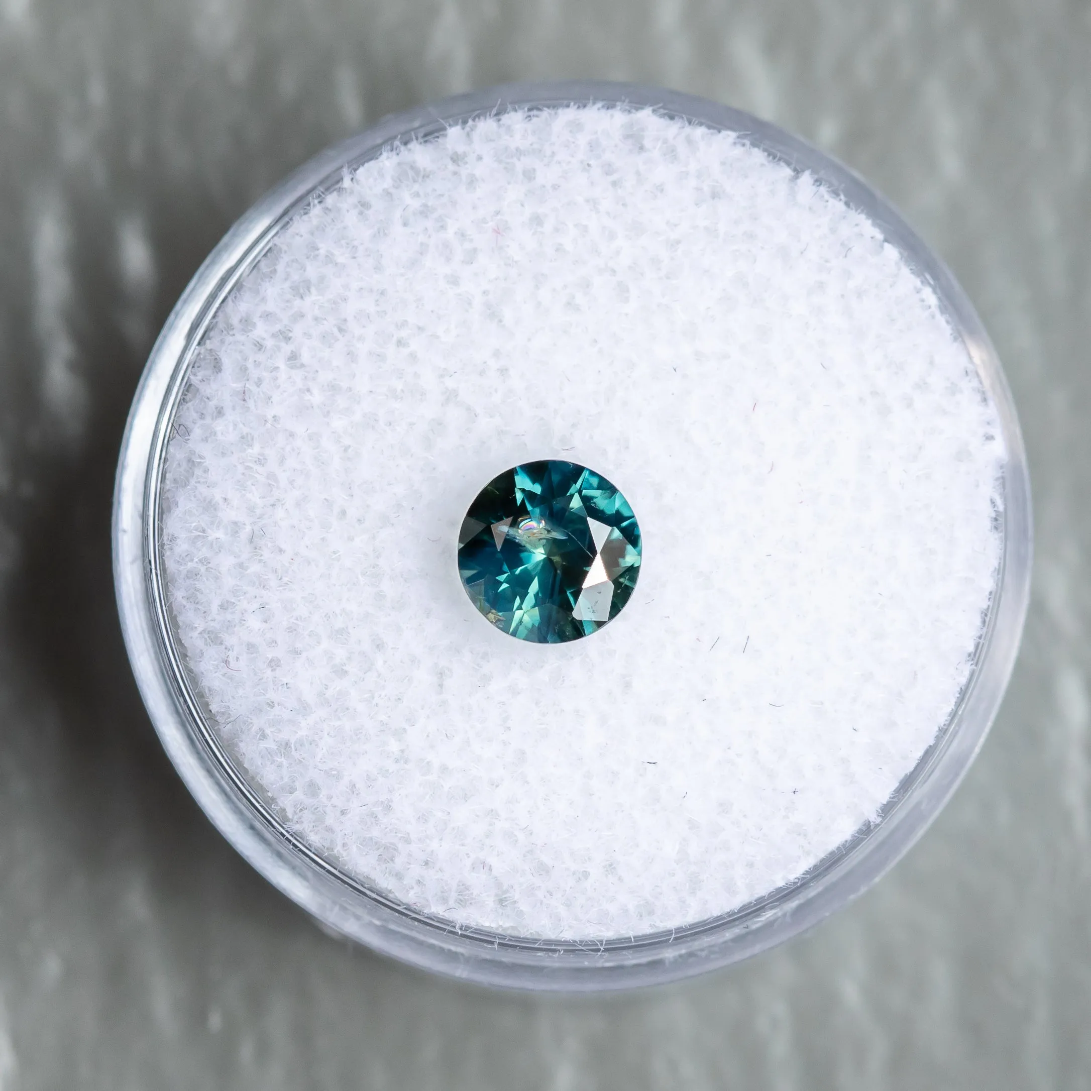 1.03CT ROUND NIGERIAN SAPPHIRE, TEAL BLUE GREEN, 6.02X3.83MM, UNTREATED