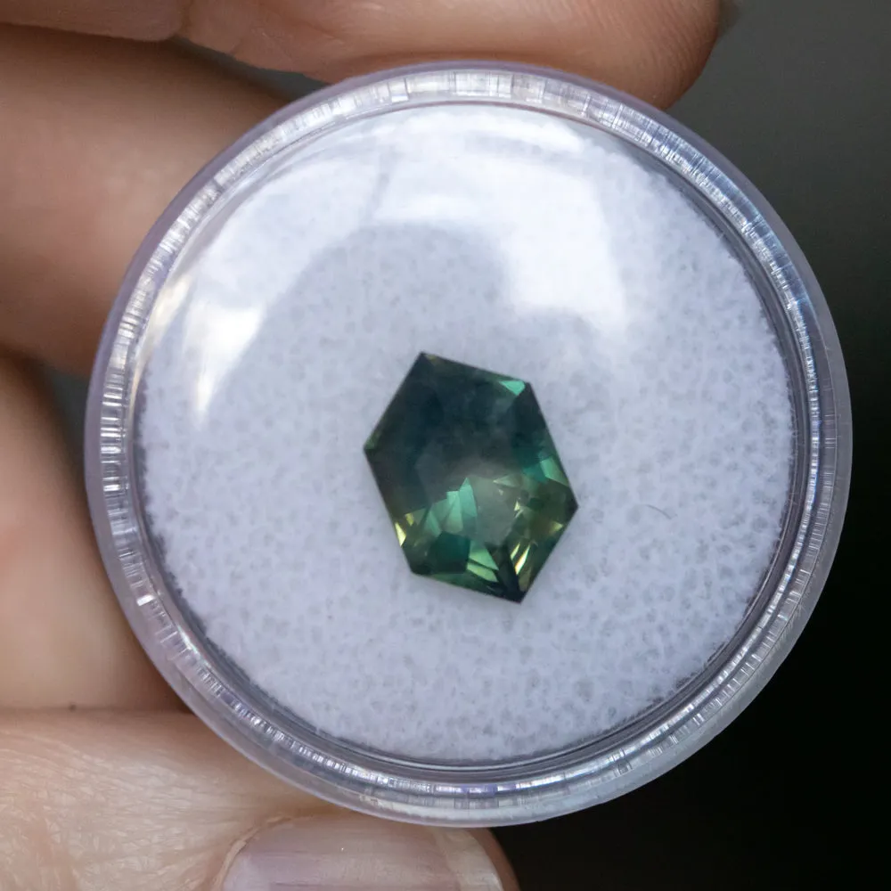 3.33CT ELONGATED HEXAGON UNTREATED NIGERIAN SAPPHIRE, DEEP GREEN WITH SILK, 11.31X7.50X5.37MM