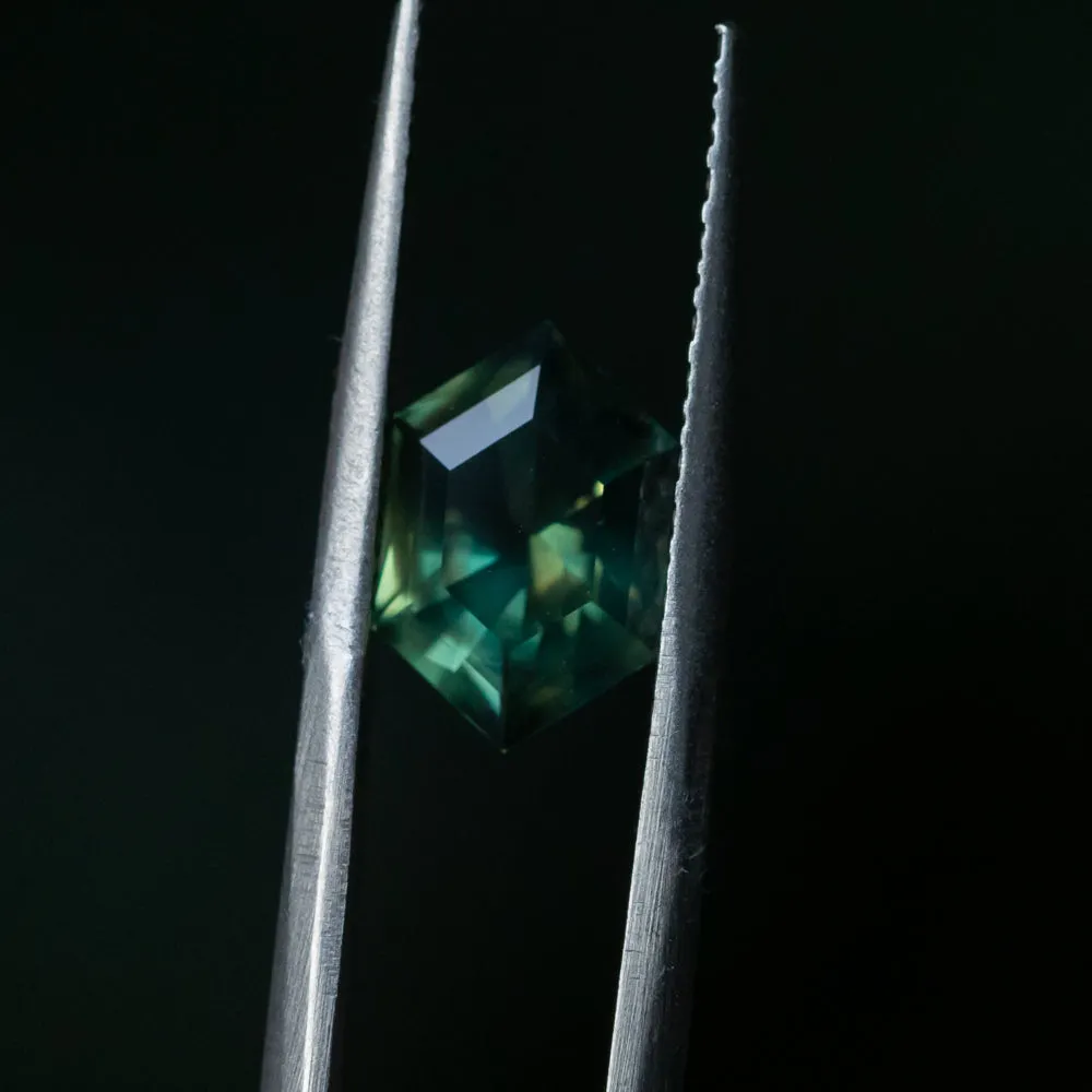 3.33CT ELONGATED HEXAGON UNTREATED NIGERIAN SAPPHIRE, DEEP GREEN WITH SILK, 11.31X7.50X5.37MM