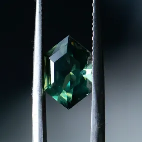 3.33CT ELONGATED HEXAGON UNTREATED NIGERIAN SAPPHIRE, DEEP GREEN WITH SILK, 11.31X7.50X5.37MM